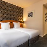 Aris Grand Place Hotel