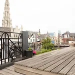 Duplex dernier étage avec terasse à deux pas de la grand place