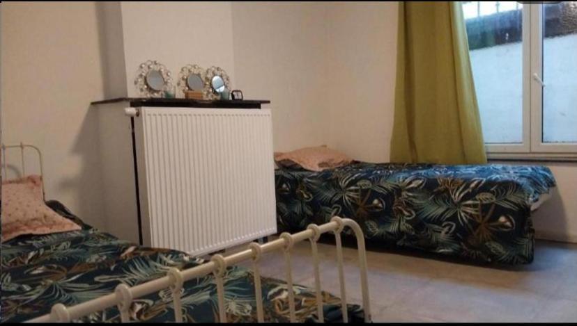 2lit Celibataire Schaarbeek Sous-sol *