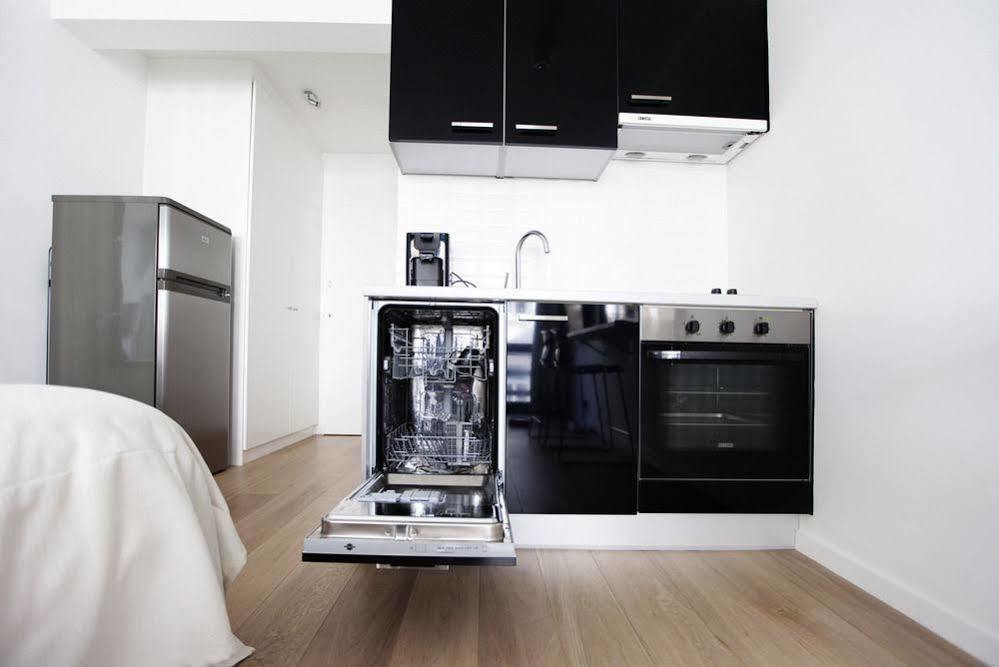 Chic Suisse Flat - Metro Louise Apartment