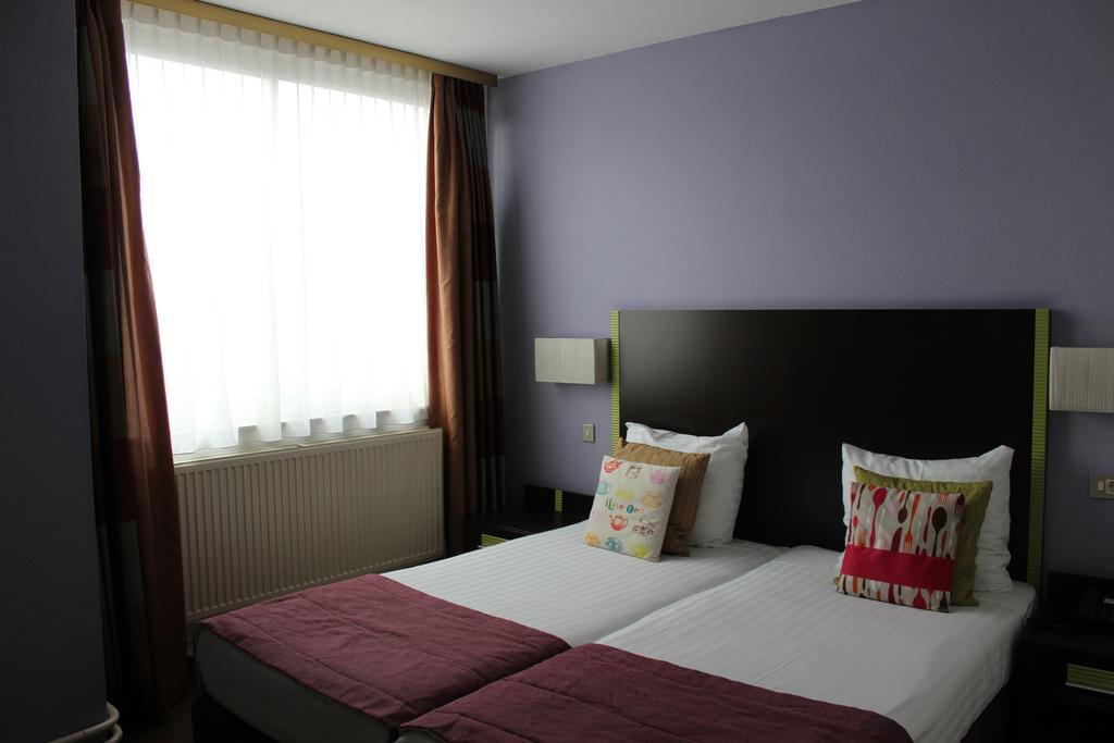 Khách sạn Floris Arlequin Grand-place 3*